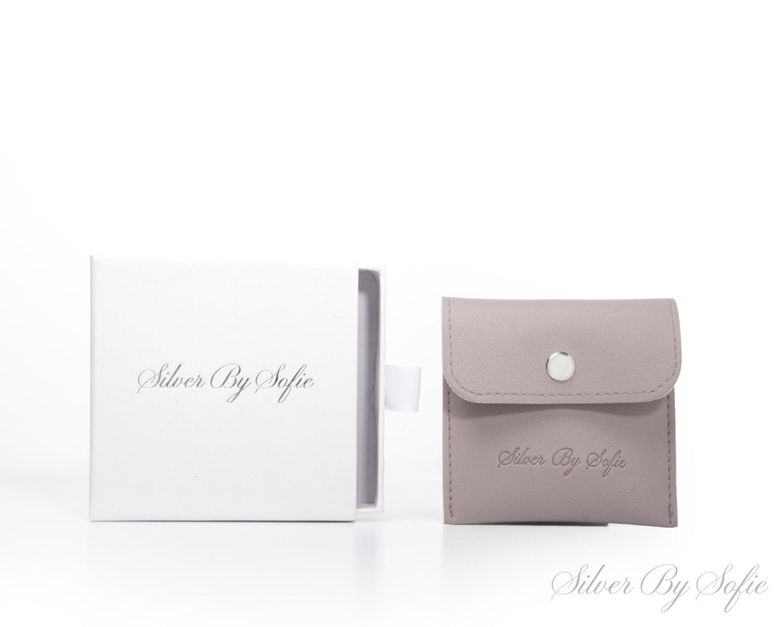 Light blue opal oval shaped sterling silver earrings