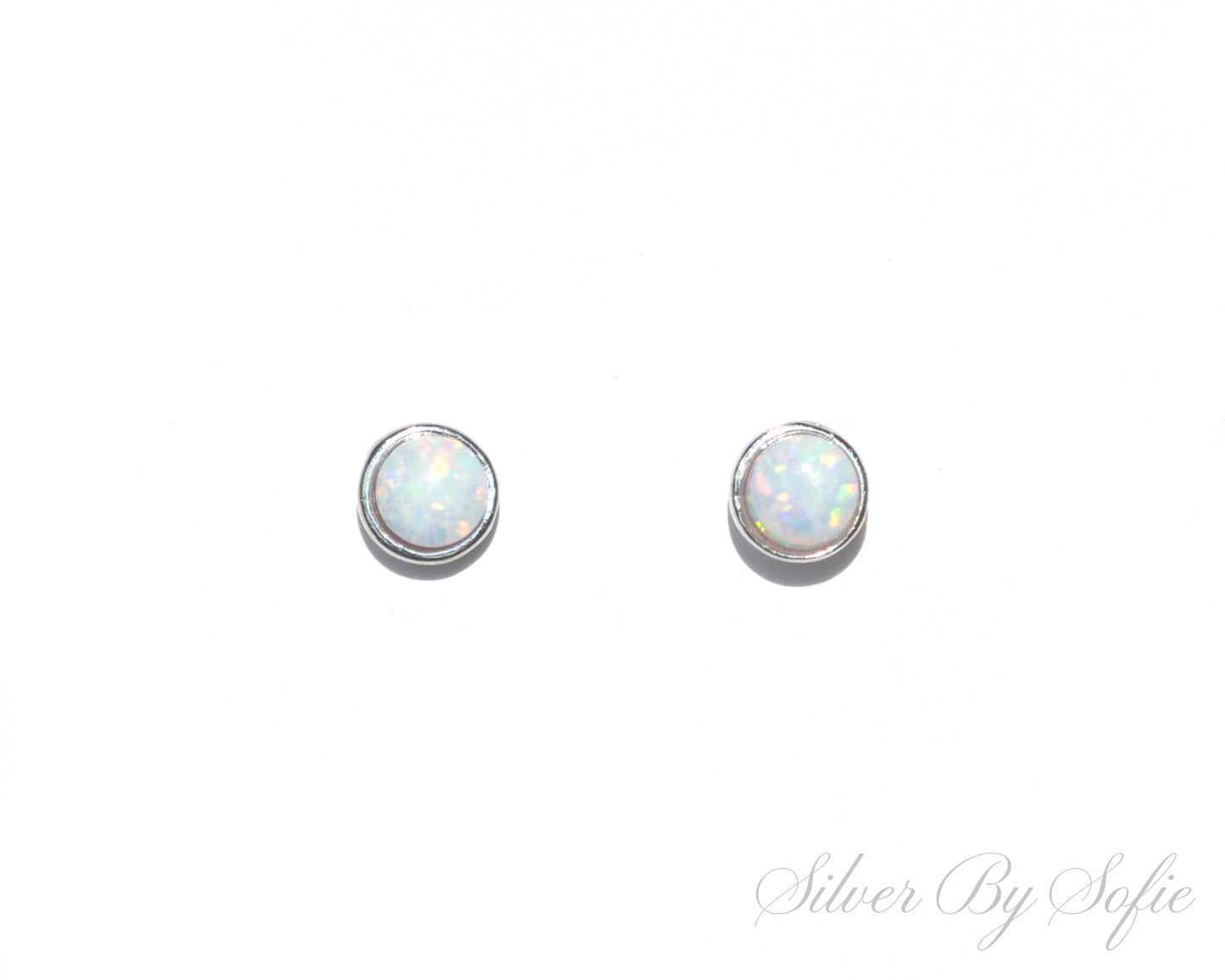 Small circular white opal sterling silver stud earrings