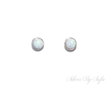 Small circular white opal sterling silver stud earrings