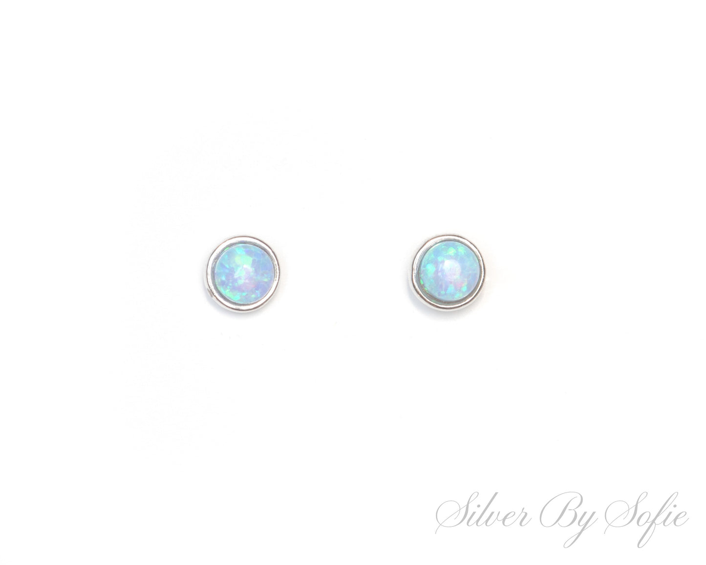 Small circular light blue opal sterling silver stud earrings