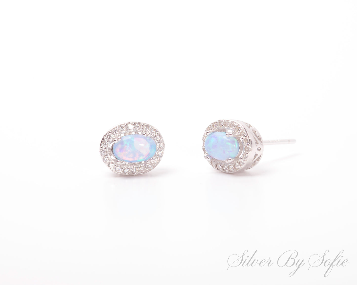 Light blue opal oval shaped sterling silver earrings