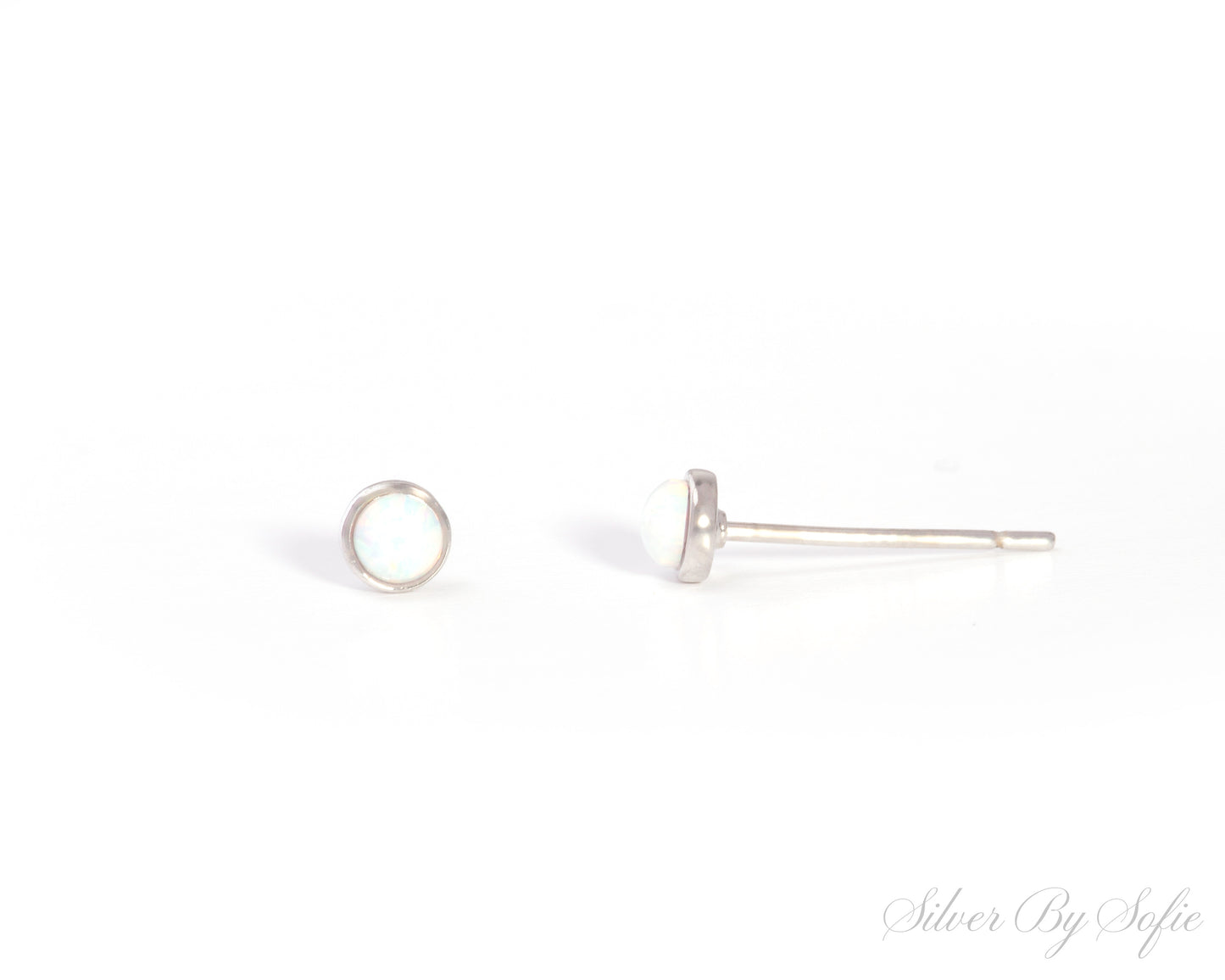 Small circular white opal sterling silver stud earrings