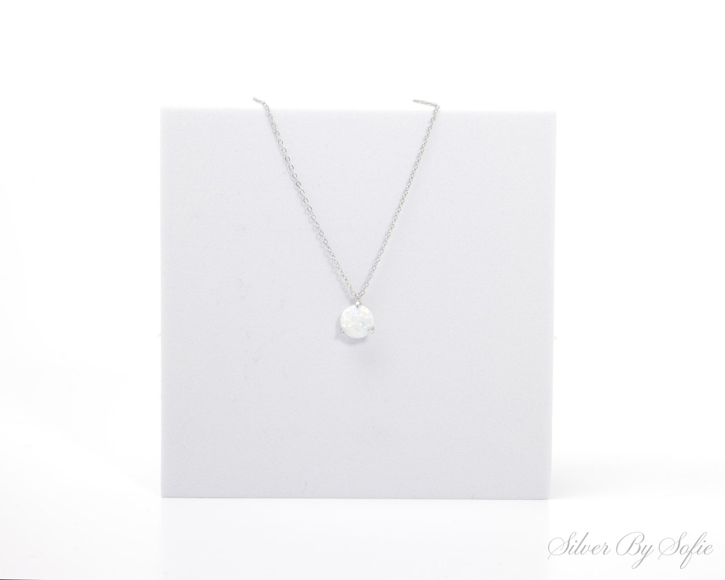 White opal sterling silver 3 prong necklace