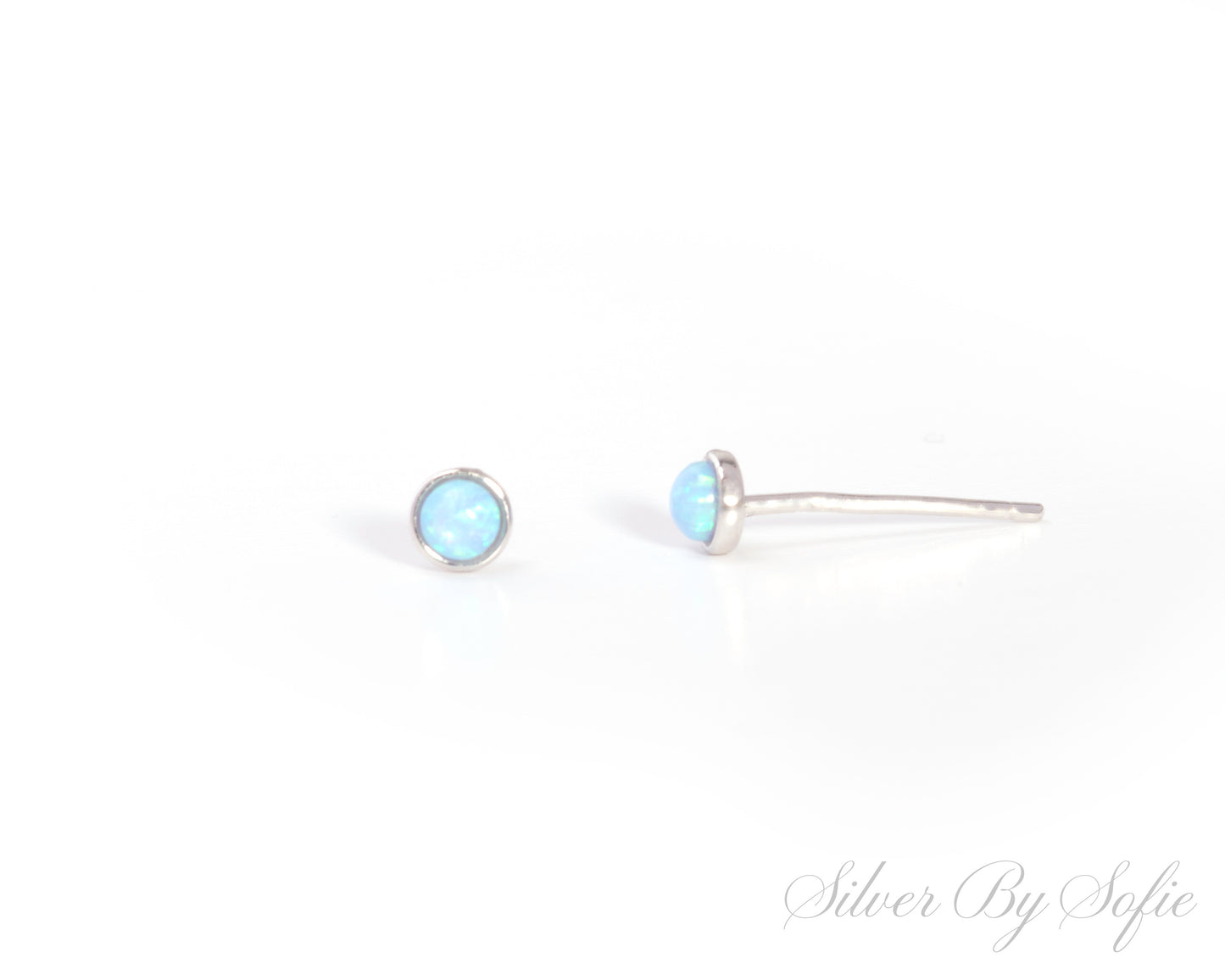 Small circular light blue opal sterling silver stud earrings
